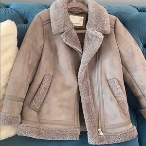 Warm fuzzy shearling coat